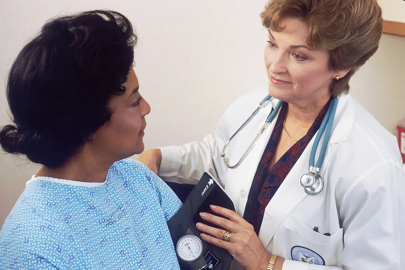 A clinician talking with a patient